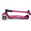 image:imageMicro Kickboard  Maxi Foldable LED Kids Scooter for Ages 512  Children up to 110 lbs  3 Wheel LeantoSteer Design  Adjustable T Bar  Smooth Ride Motion Activated PU LED Wheels  Swiss DesignBerry Red