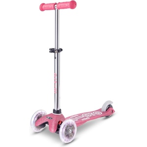 image:imageMicro Kickboard  Mini Deluxe Glitter LED Kids Scooter for Ages 25  Children up to 110 lbs  3 Wheel LeantoSteer Design  Adjustable T Bar  MotionActivated PU LED Wheels  Swiss DesignGlitter Pink