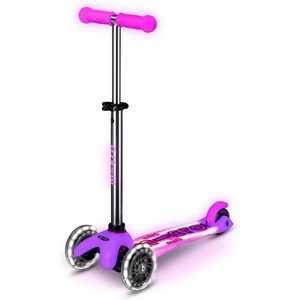 image:imageMicro Kickboard  Mini Deluxe Glow Plus LED Scooter  Adjustable Handlebar  LeantoSteer  Lightweight  ThreeWheeled  Kids Ages 25 yrsFrosty Pink